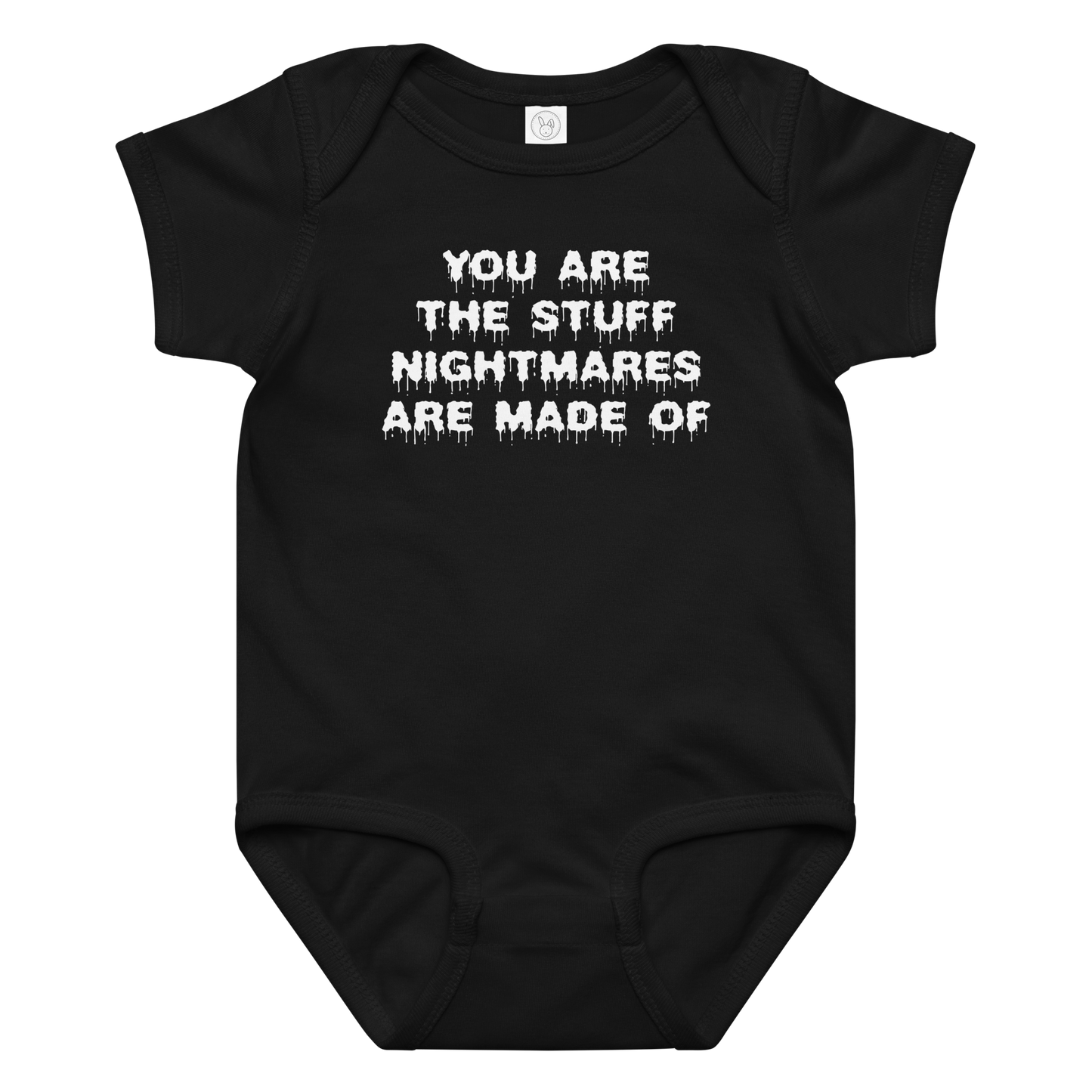 "You are the stuff nightmares are made of" printed on a black baby jersey bodysuit laying on a flat surface amongst other clothes