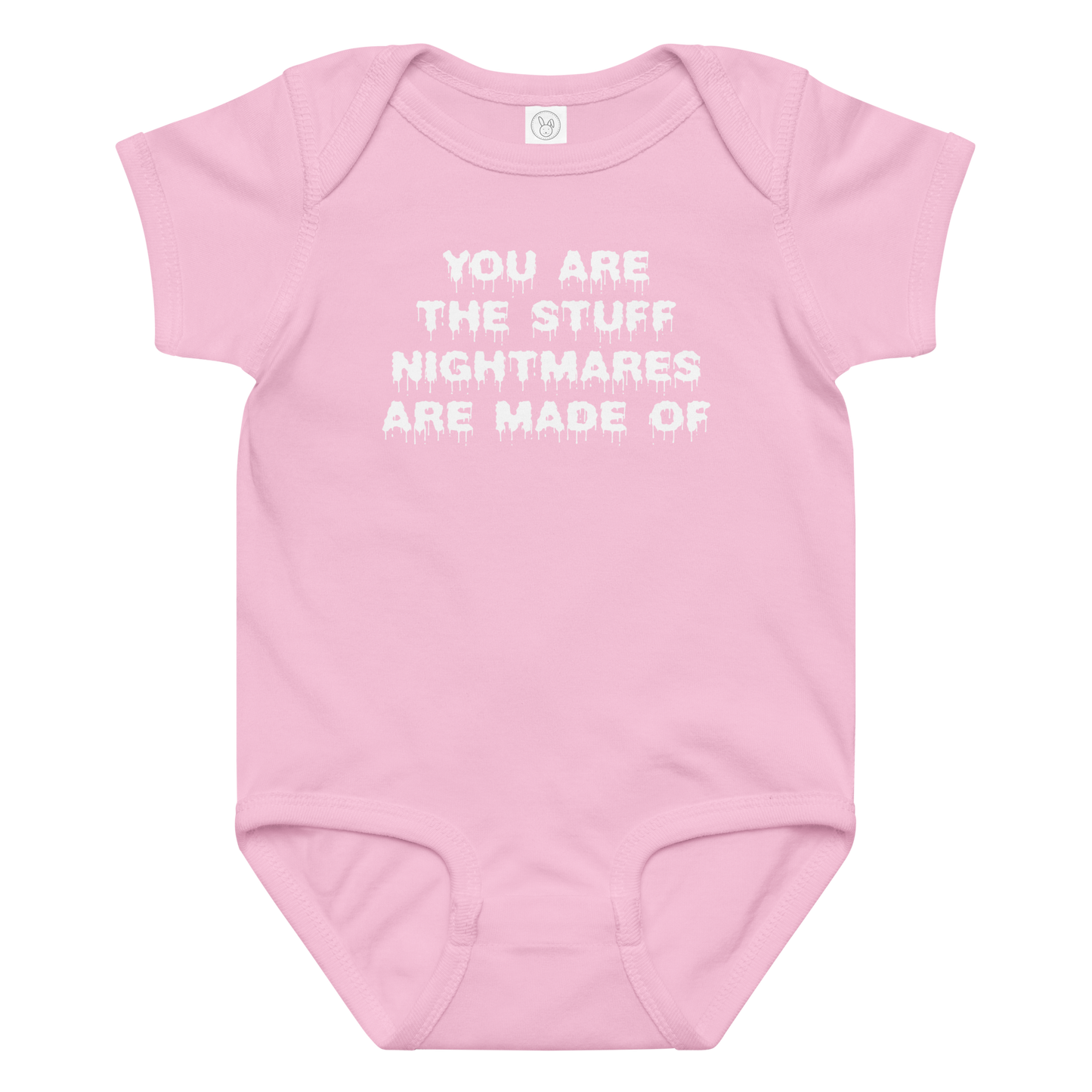 "You are the stuff nightmares are made of" printed on a pink baby jersey bodysuit laying on a flat surface amongst other clothes