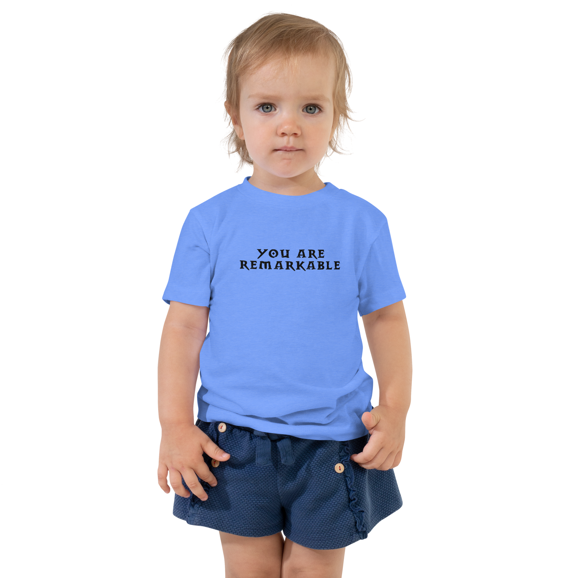 "You are remarkable" printed on a heather columbia blue toddler short sleeve tee worn by a female