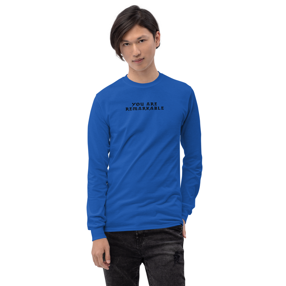 "You are remarkable" printed on a royal men's long sleeve shirt worn by a male