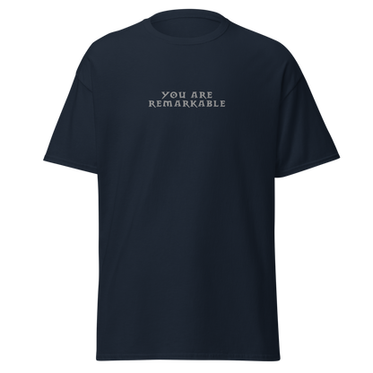 "You are remarkable" printed on a navy on an invisible body