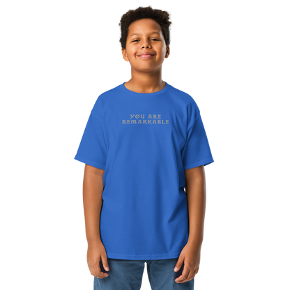 "You are remarkable" printed on a royal youth classic tee worn by a male