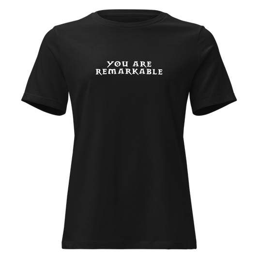 "You are remarkable" printed on a black on an invisible / simulated body