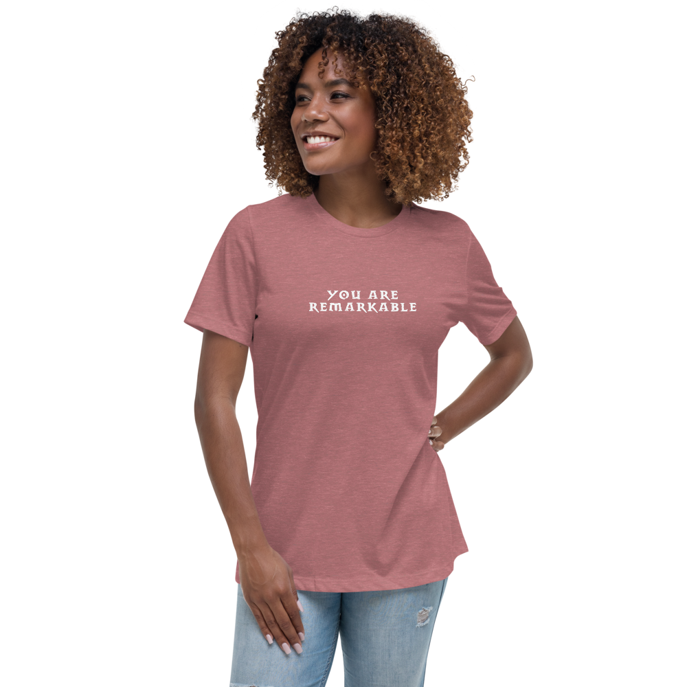 "You are remarkable" printed on a heather mauve women's relaxed t-shirt worn by a female