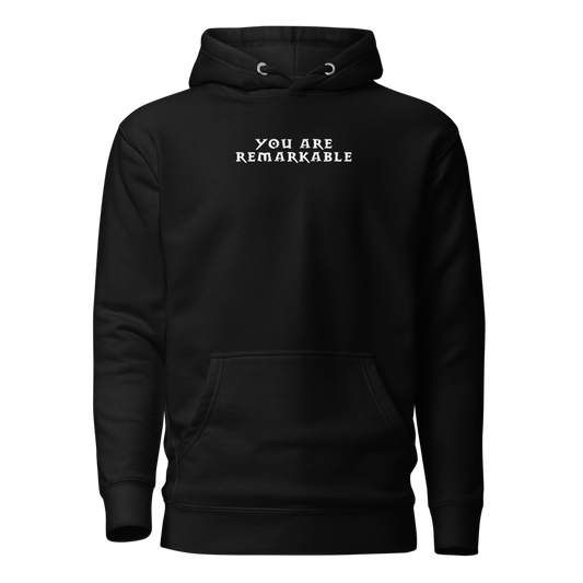 "You are remarkable" printed on a black on an invisible / simulated body