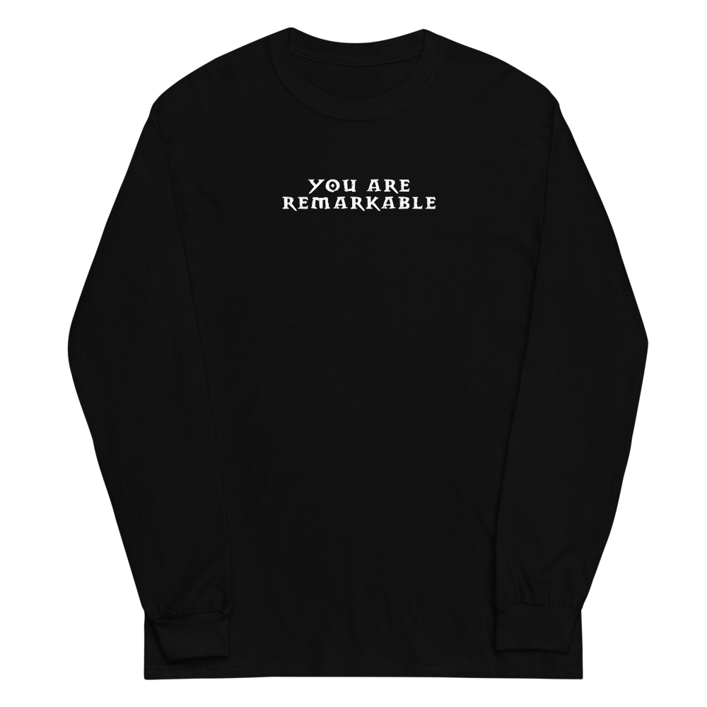 "You are remarkable" printed on a black men's long sleeve shirt laying on a flat surface