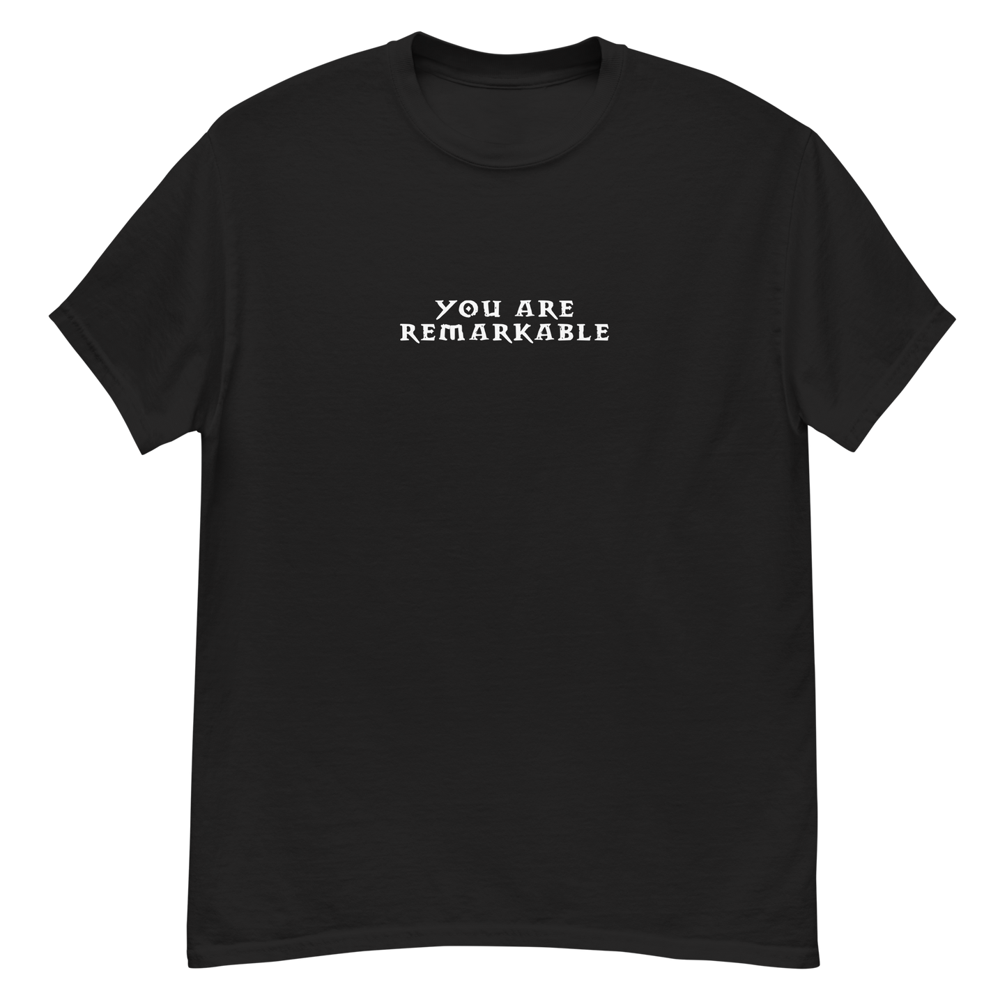 "You are remarkable" printed on a black unisex classic tee laying on a flat surface