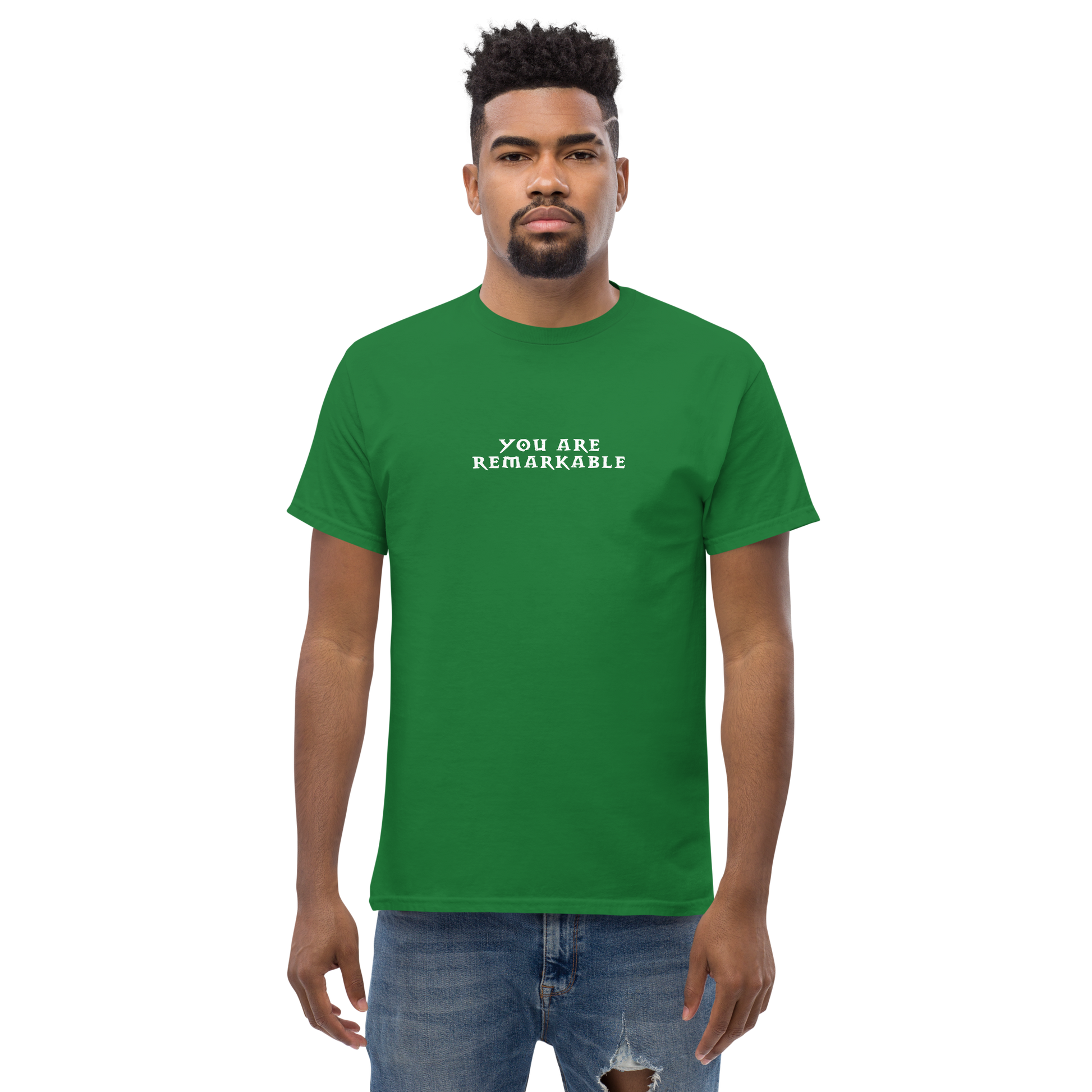 "You are remarkable" printed on a turf green unisex classic tee worn by a male
