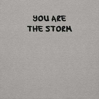 "You are the storm" printed on a carbon grey background
