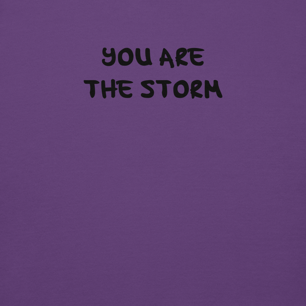 "You are the storm" printed on a purple background