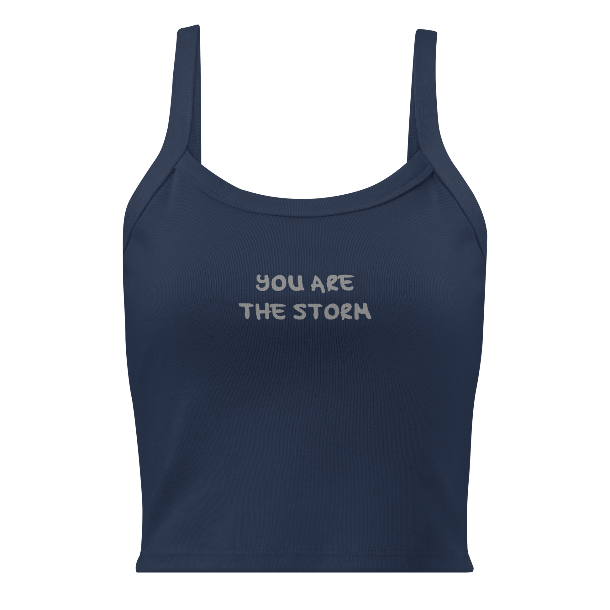 "You are the storm" printed on a solid navy blend women's micro-rib tanktop laying on a flat surface