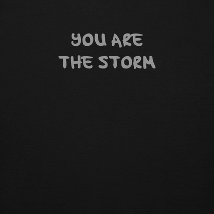 "You are the storm" printed on a black background