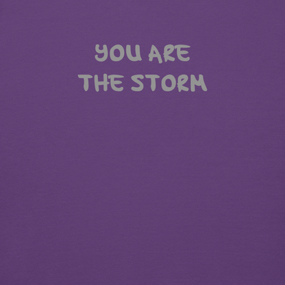"You are the storm" printed on a purple background