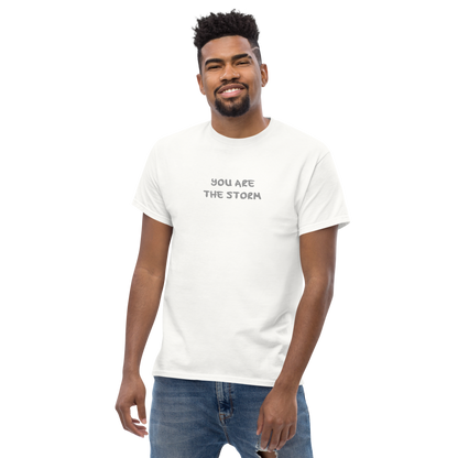 "You are the storm" printed on a white unisex classic tee worn by a male
