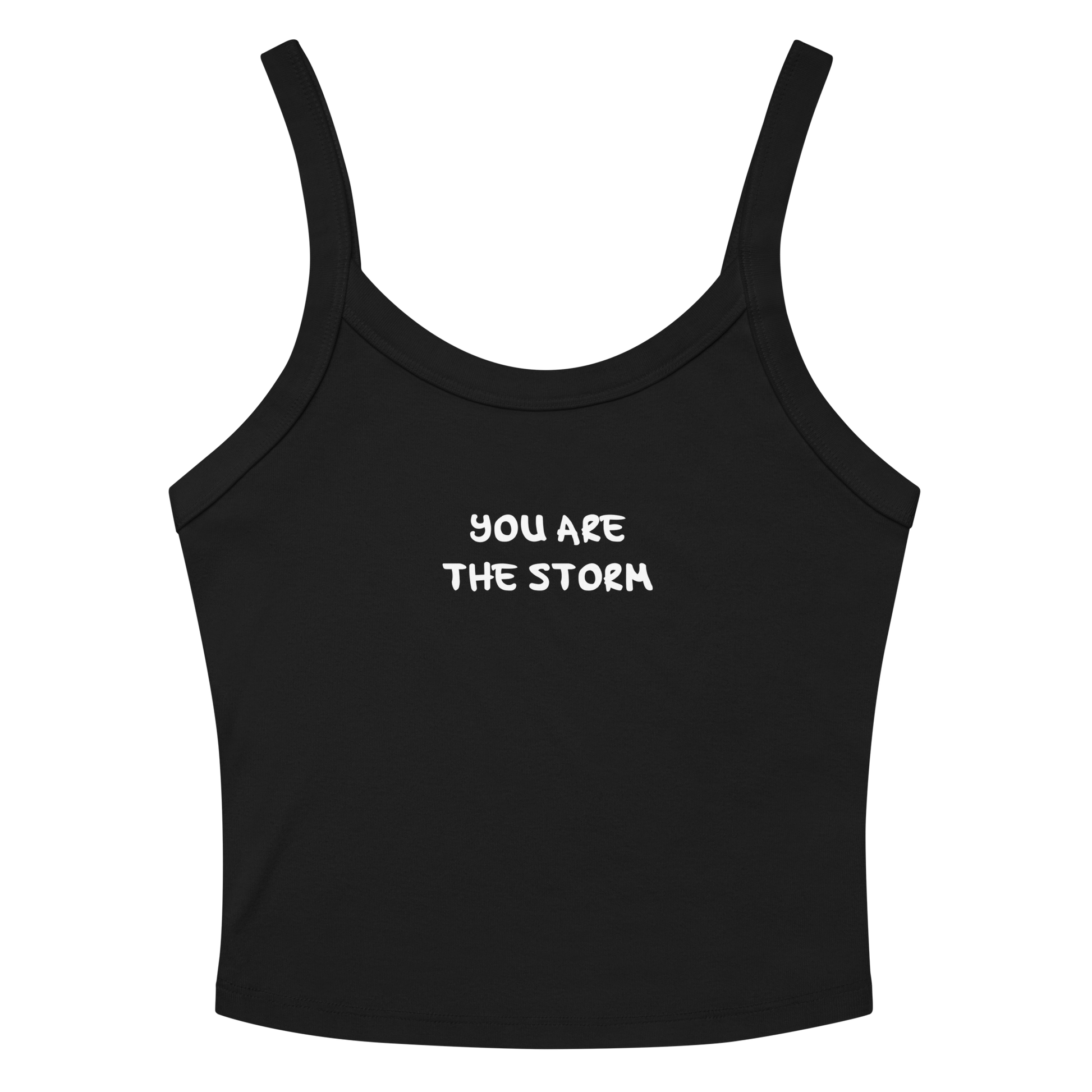 "You are the storm" printed on a solid black blend women's micro-rib tanktop laying on a flat surface amongst sunglasses and shorts