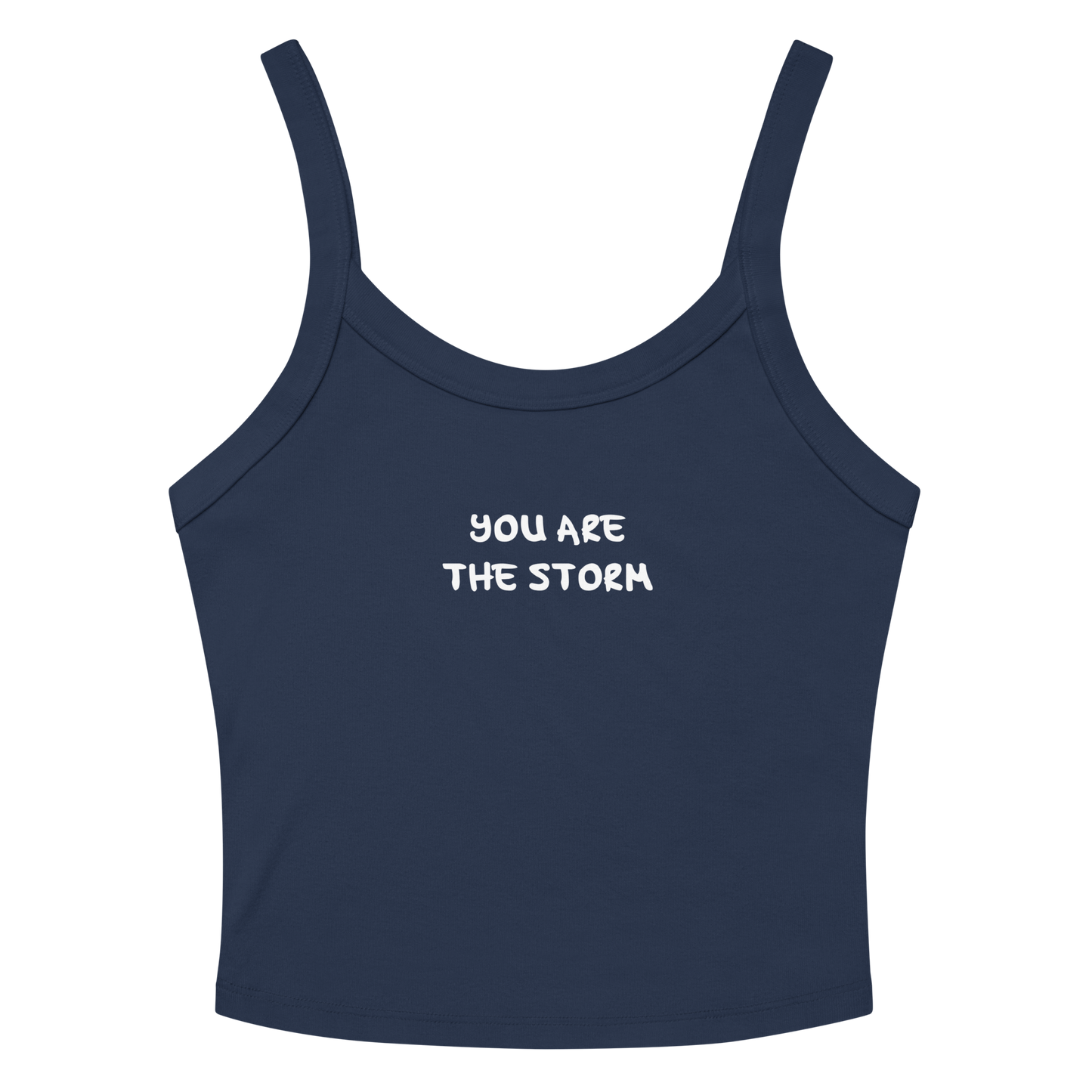 "You are the storm" printed on a solid navy blend women's micro-rib tanktop laying on a flat surface amongst sunglasses and shorts