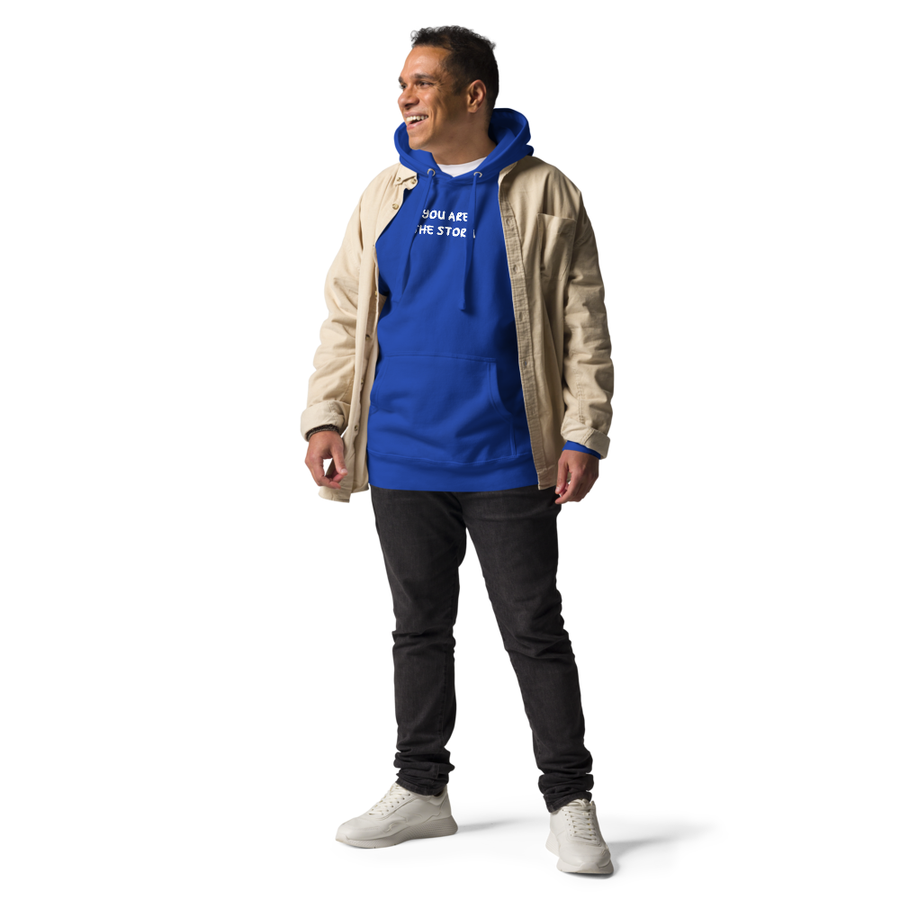 "You are the storm" printed on a team royal unisex hoodie worn by a male with a jacket on top