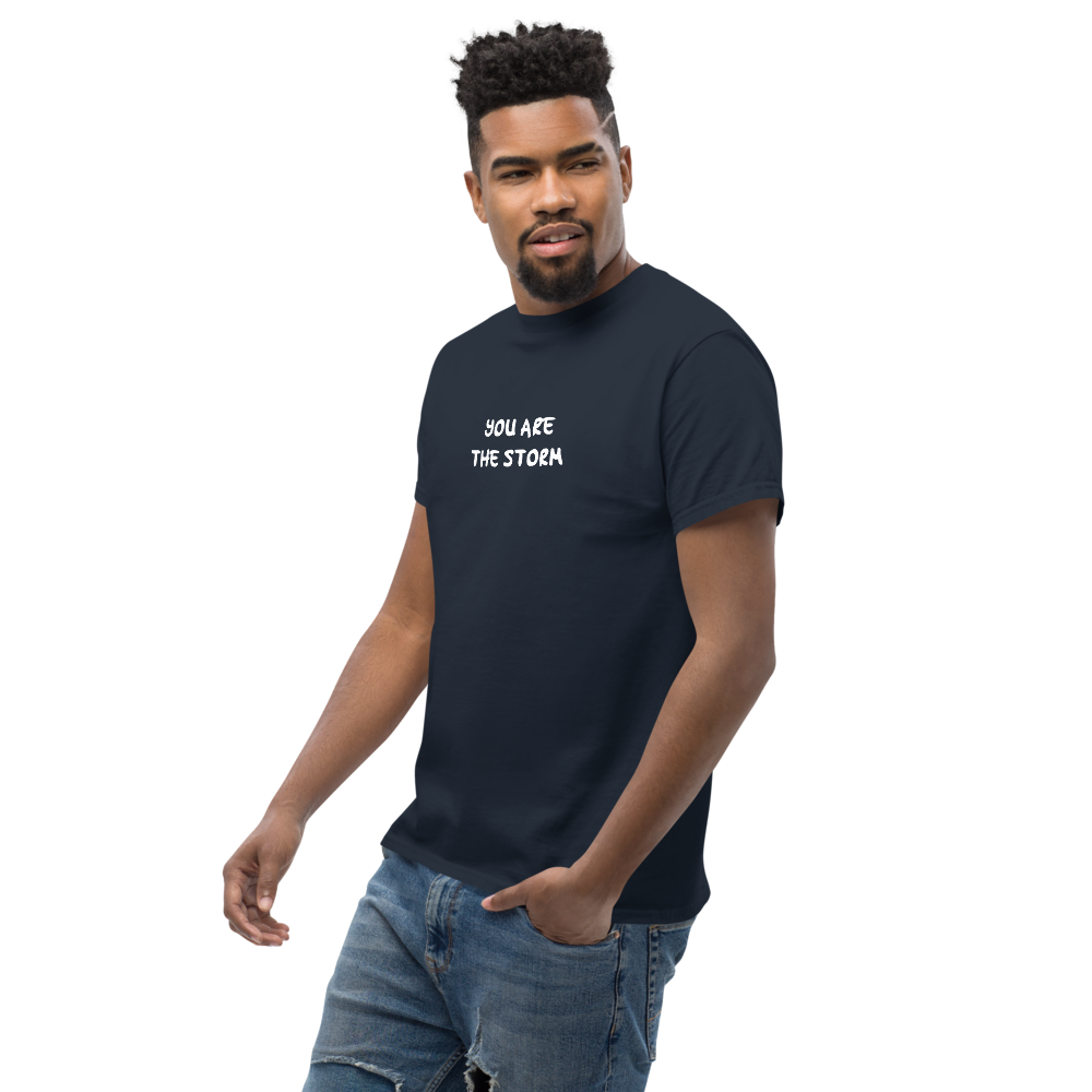 "You are the storm" printed on a navy unisex classic tee worn by a male