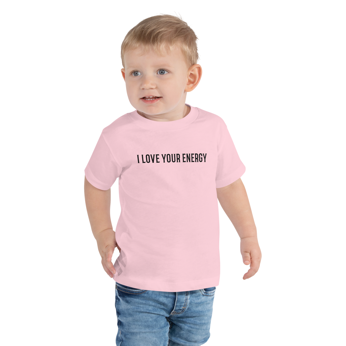 "I love your energy" printed on a pink toddler short sleeve tee worn by a male