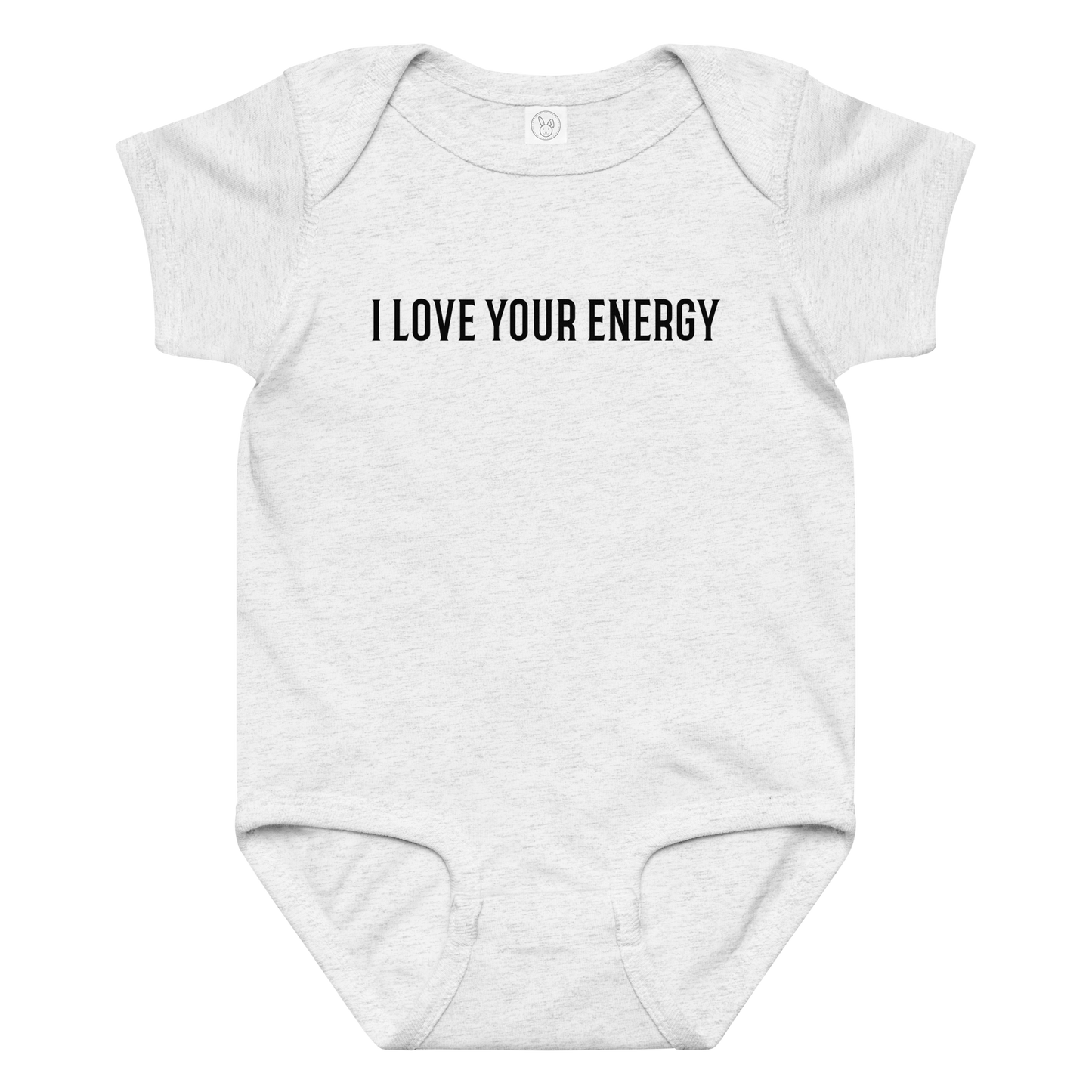 "I love your energy" printed on a ash baby jersey bodysuit laying on a flat surface amongst other clothes