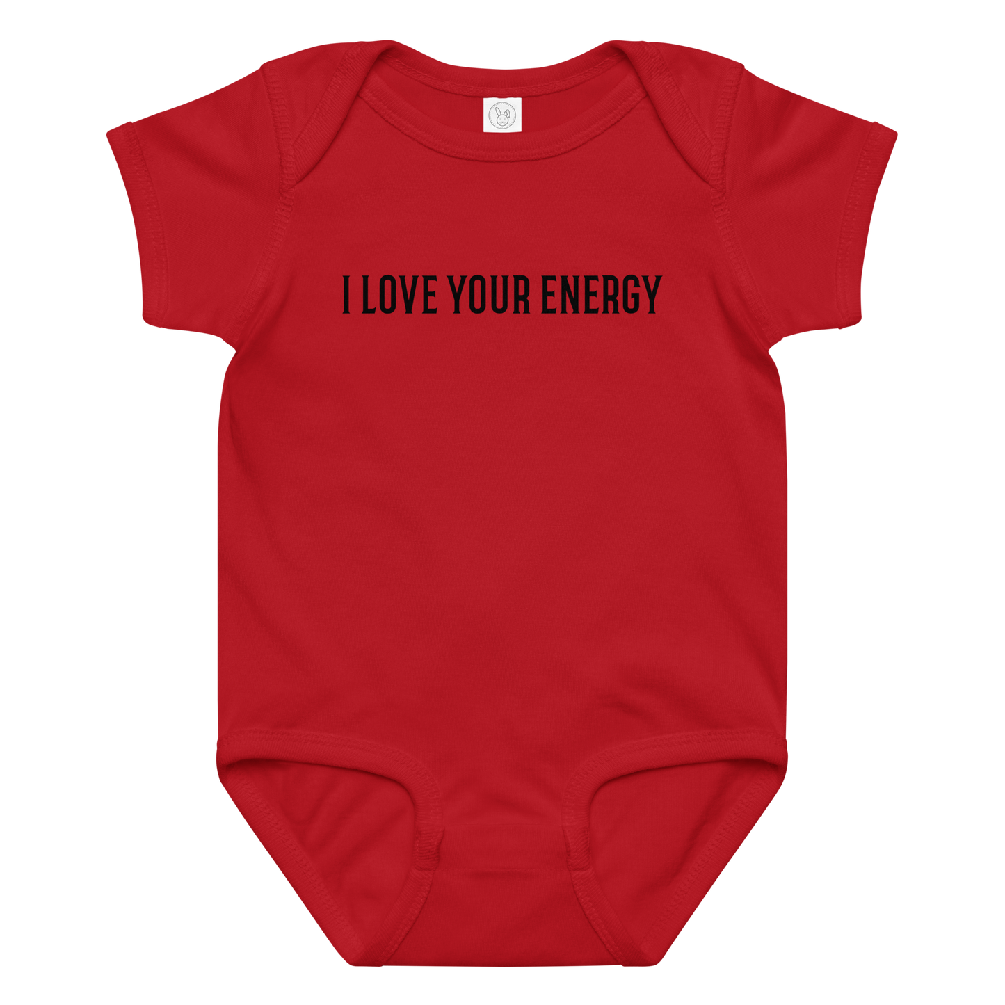 "I love your energy" printed on a red baby jersey bodysuit laying on a flat surface amongst other clothes