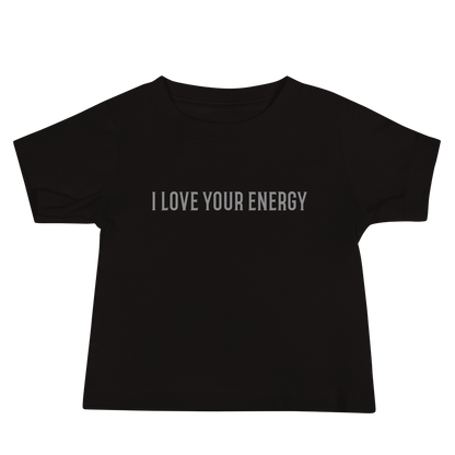 "I love your energy" printed on a black baby jersey short sleeve tee laying on a flat surface