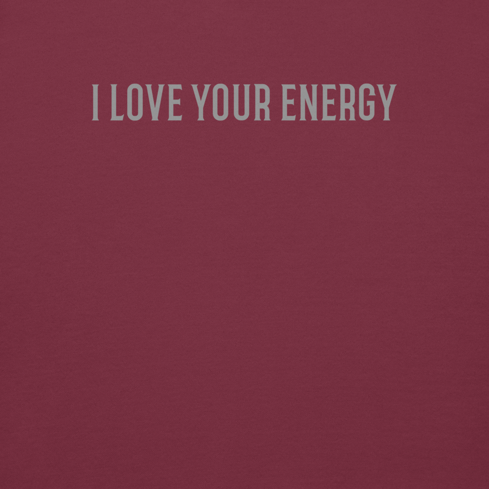 "I love your energy" printed on a maroon background