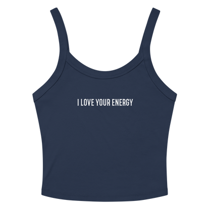 "I love your energy" printed on a solid navy blend women's micro-rib tanktop laying on a flat surface amongst sunglasses and shorts