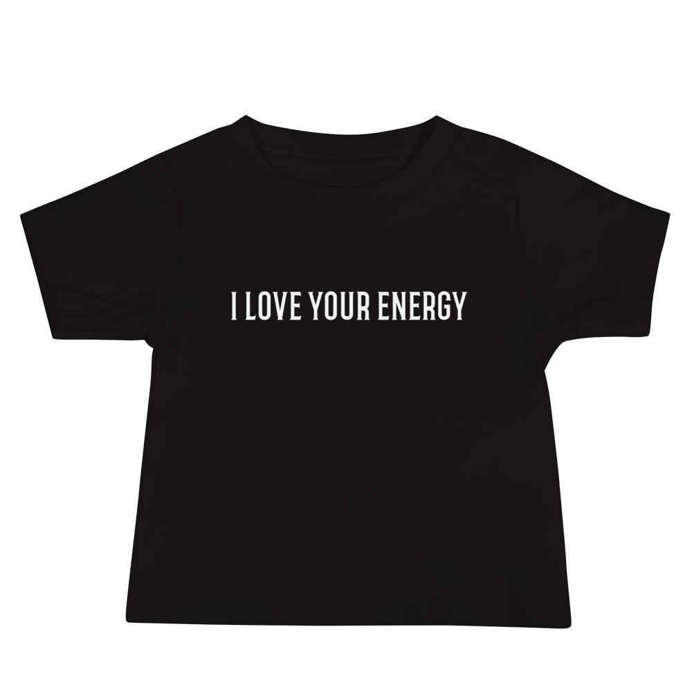"I love your energy" printed on a black baby jersey short sleeve tee laying on a flat surface