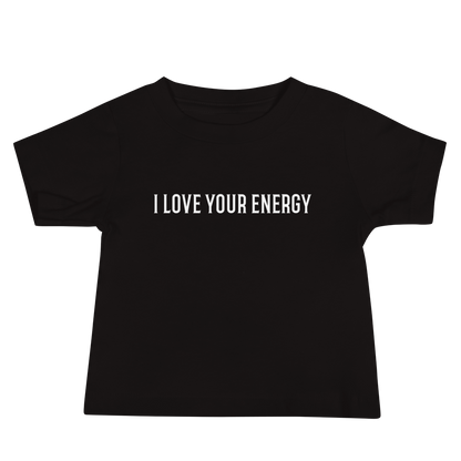 "I love your energy" printed on a black baby jersey short sleeve tee laying on a flat surface