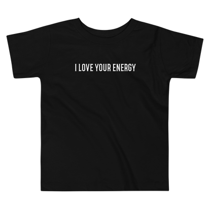 "I love your energy" printed on a black toddler short sleeve tee laying on a flat surface