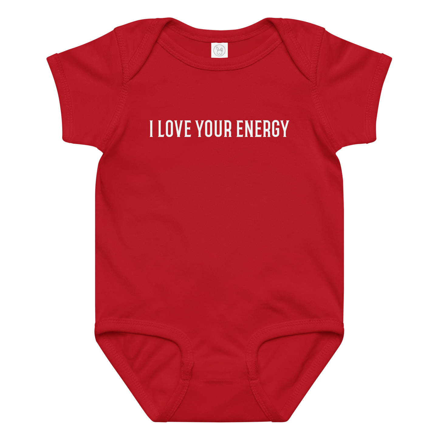 "I love your energy" printed on a red baby jersey bodysuit laying on a flat surface amongst other clothes